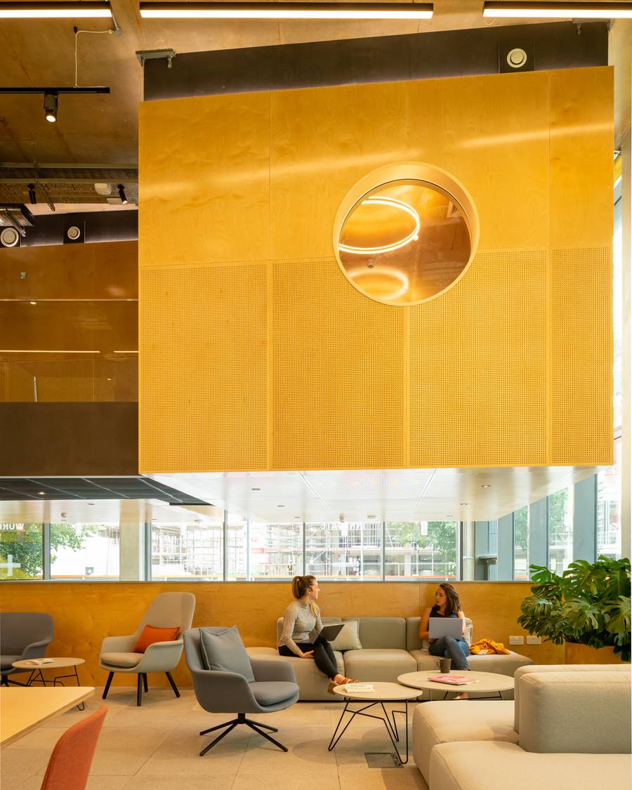 Two people in the coworking space of Plus X Brighton