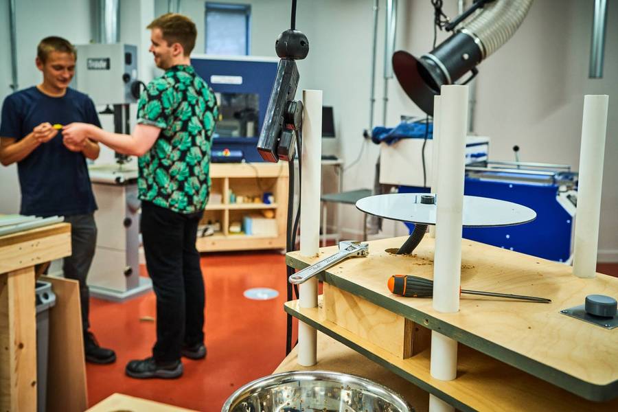 People working together in the Plus X Innovation Brighton workshop