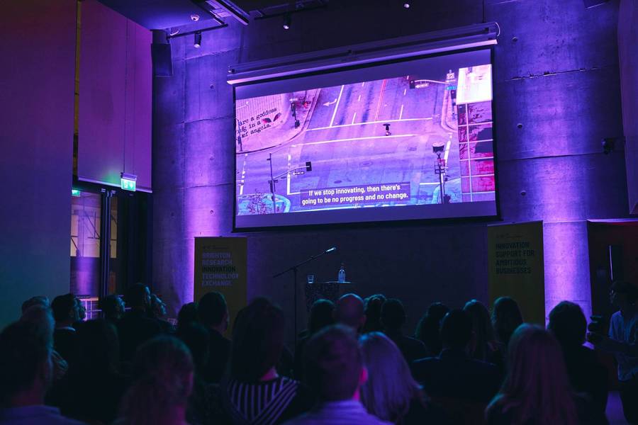 Members watching a film in the Launch Space, Brighton