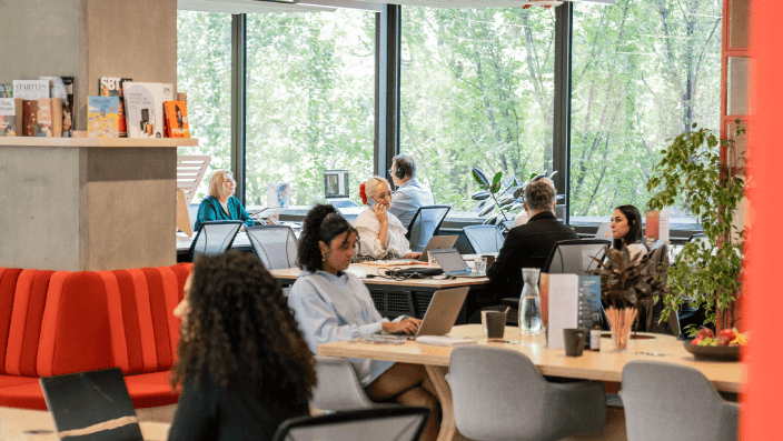 An artist's imagination of people working in their own private large leased office at Plus X Innovation Brighton