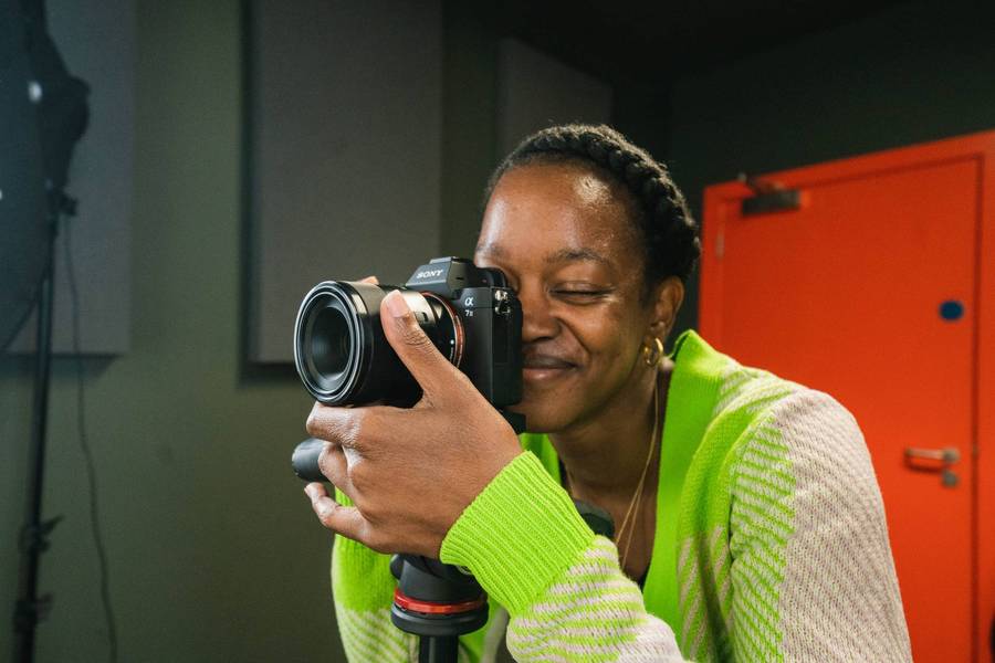 A member using the Plus X Innovation Photography Suite