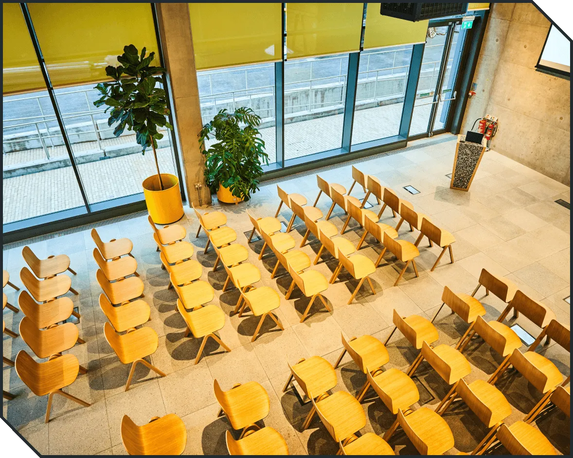 Rows of chairs laid out for an event in the Launchspace Plus X Innovation Brighton