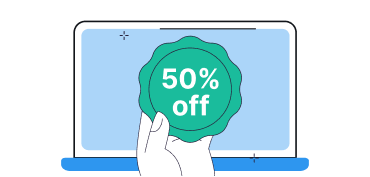 Hand holding a green badge displaying 50% off in front of a laptop screen.