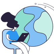 Person sitting and using a laptop with a large globe behind them.