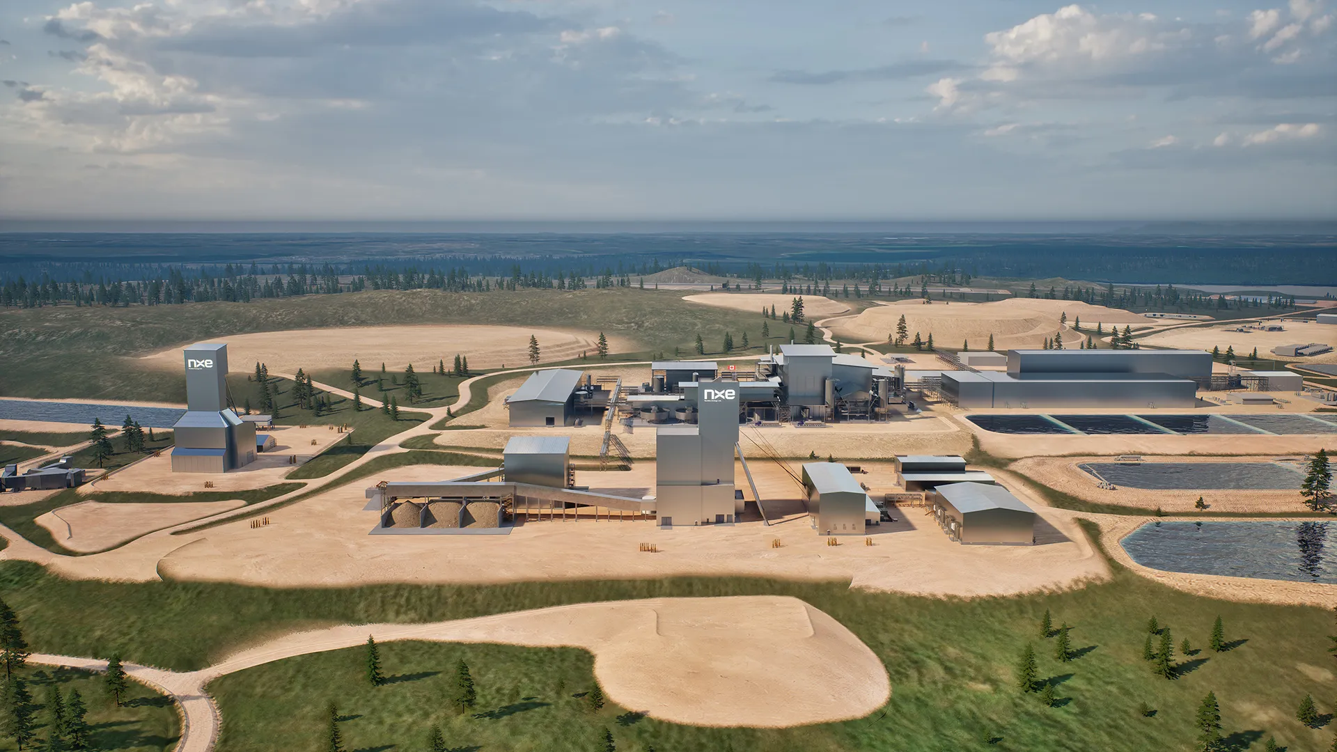 Aerial view of an industrial mining site with multiple buildings, dirt roads, and ponds.