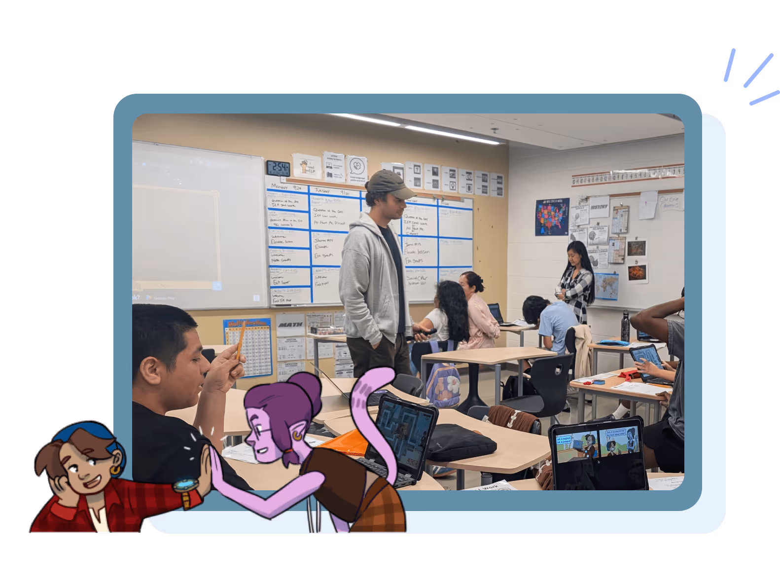 Classroom scene with students at desks using laptops, a teacher standing and interacting, and educational posters on the walls.