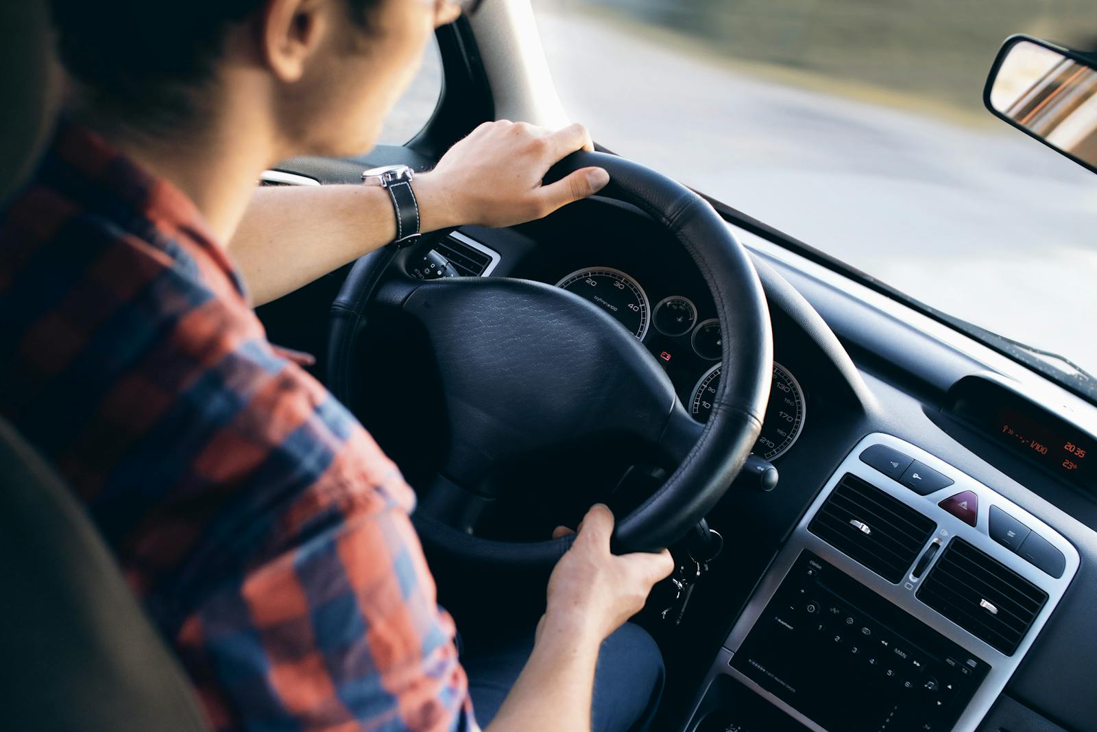 Rideshare passenger using the Uber app in a vehicle in San Diego