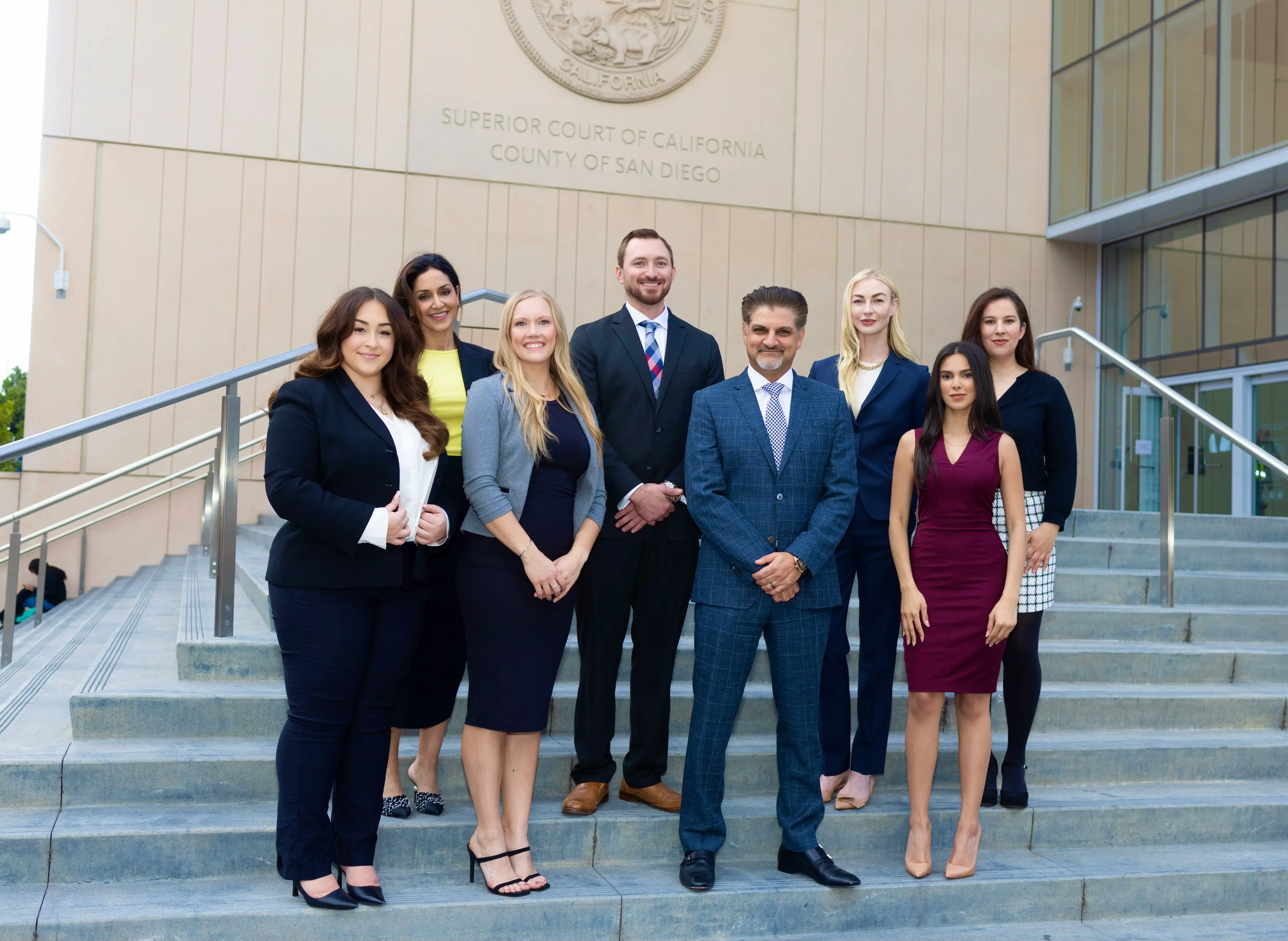 The Khashayar Law Group legal team standing on the steps of the Superior Court of California, County of San Diego