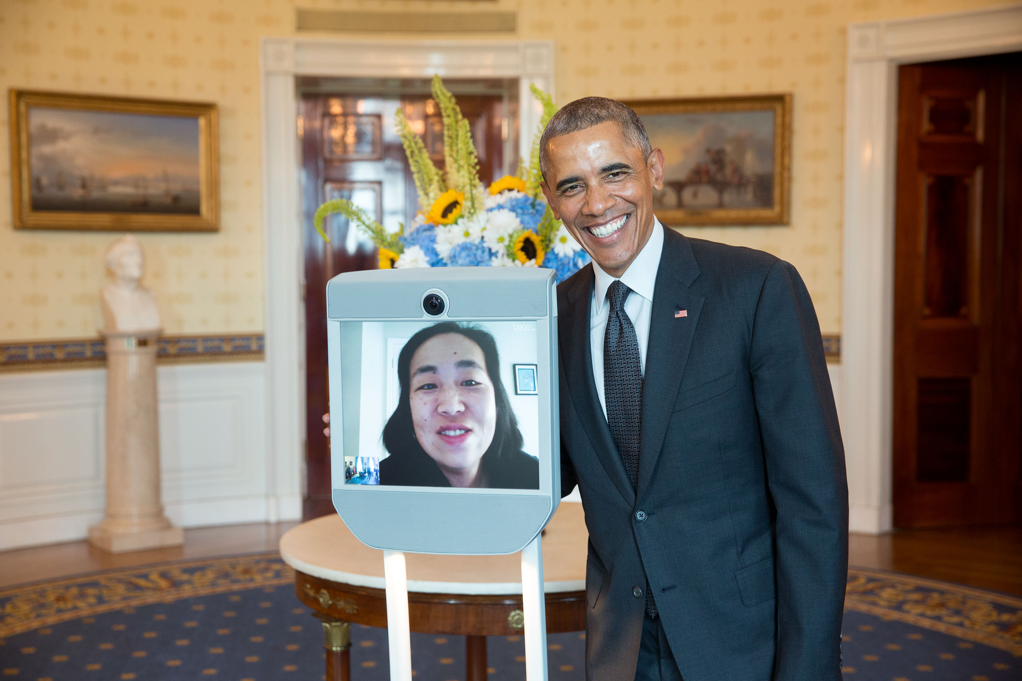Barack Obama speaking with a person via the Beam telepresence robot