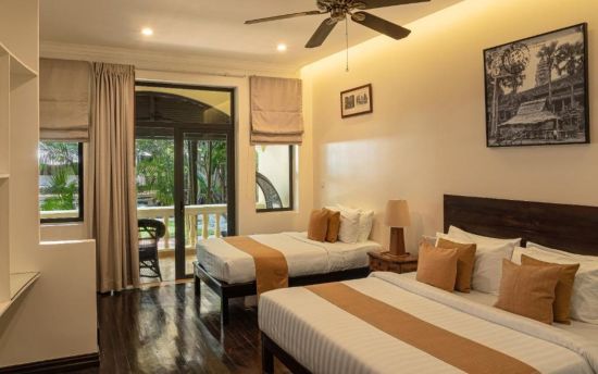 Pavillon d'Orient à Siem Reap:  Family Suite | bedroom