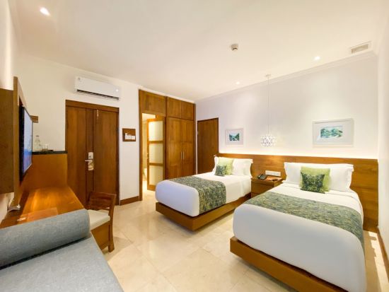 Candi Beach Resort & Spa in Ostbali:  Deluxe Garden Bungalow
