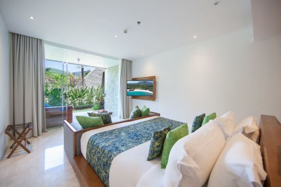 Candi Beach Resort & Spa in Ostbali:  Junior Suite Garden View