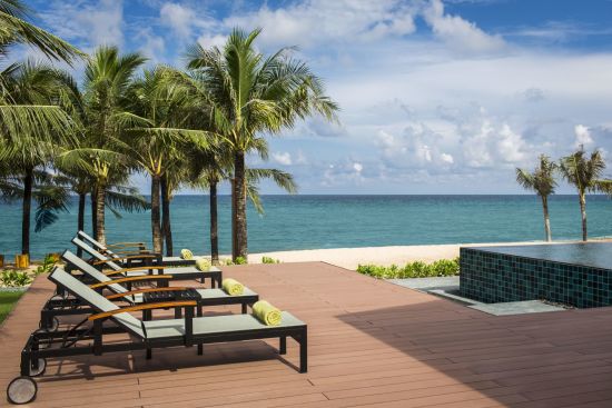 Dusit Princess Moonrise Beach Resort in Phu Quoc:  Pool and Beach View