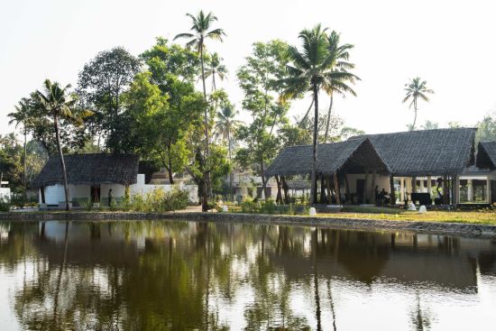 Xandari Pearl Beach Resort in Mararikulam:  By the lake