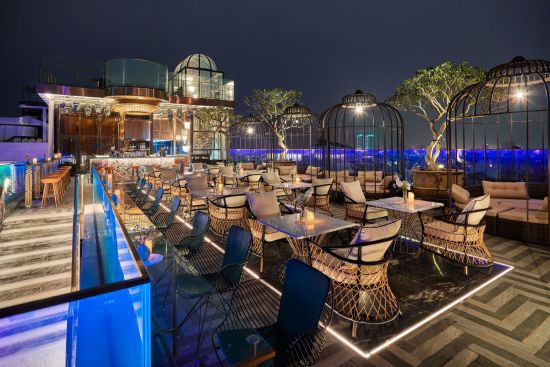 Peridot Grand Luxury Boutique Hotel in Hanoi: Rooftop terrace at night