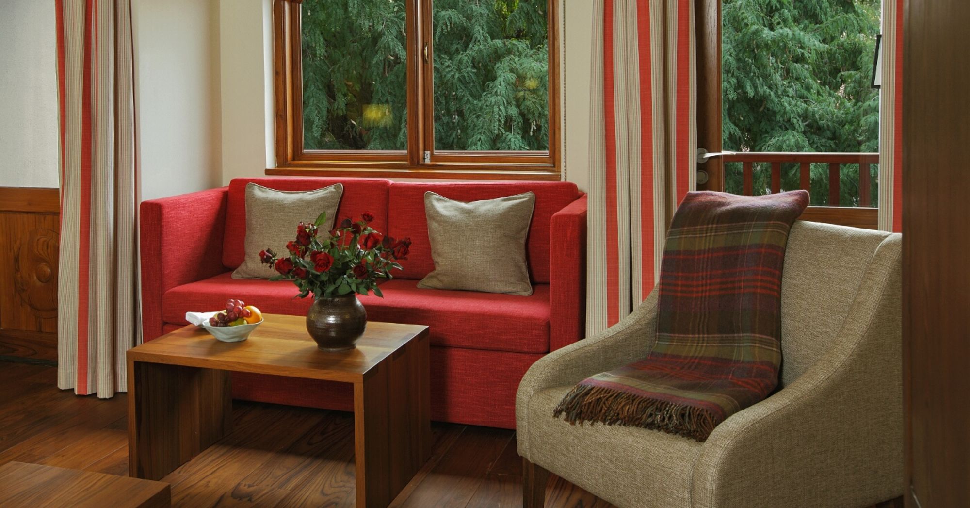 Sanctum Inle Resort in Inle Lake: Cloister red sofa 1