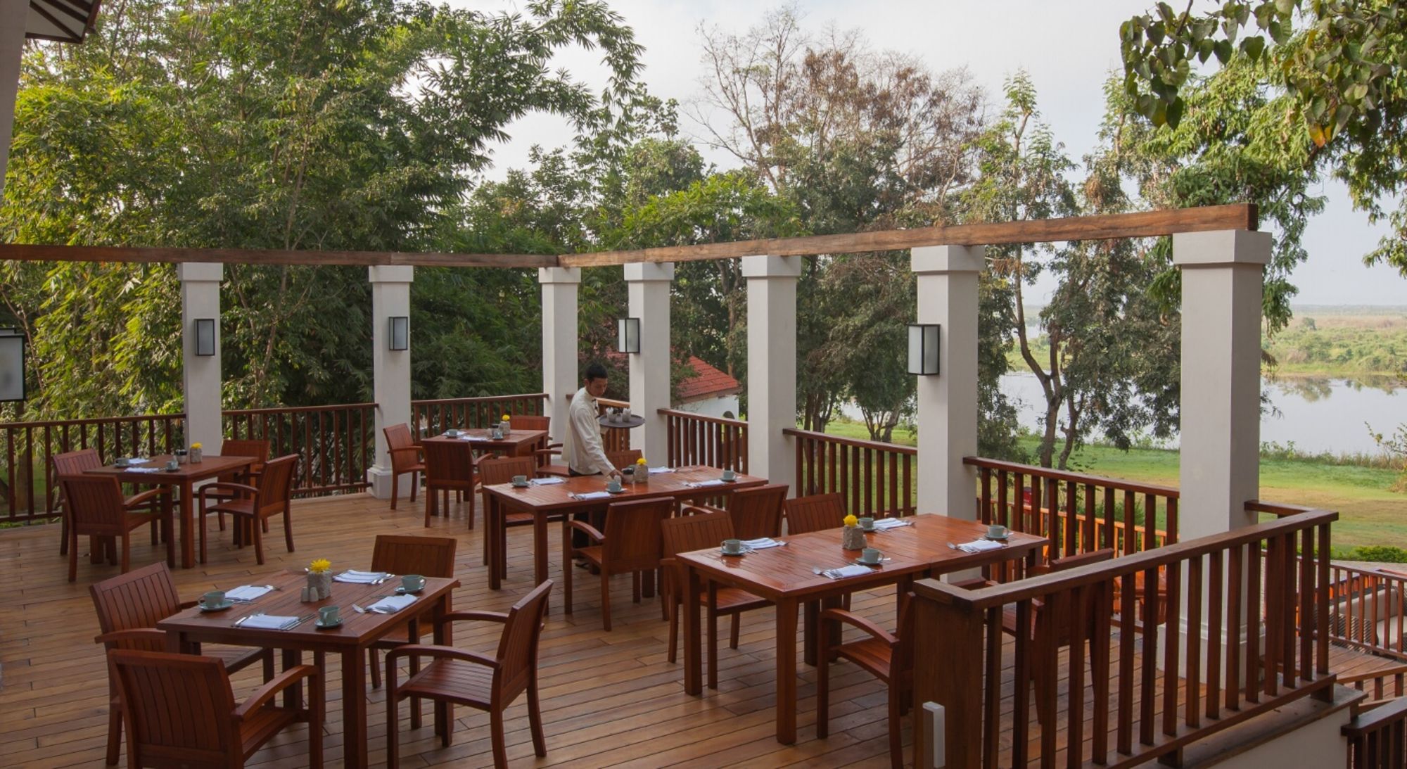 Sanctum Inle Resort in Inle Lake: Terrace set up +staff