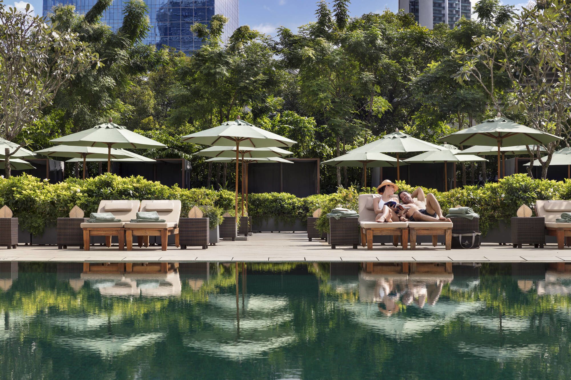 The Sukhothai Bangkok: sunbeds at the pool