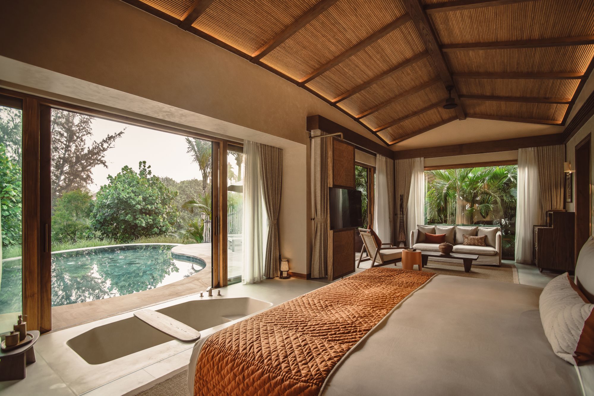 Namia River Retreat in Hoi An: Nipa Pool Villa | Bedroom