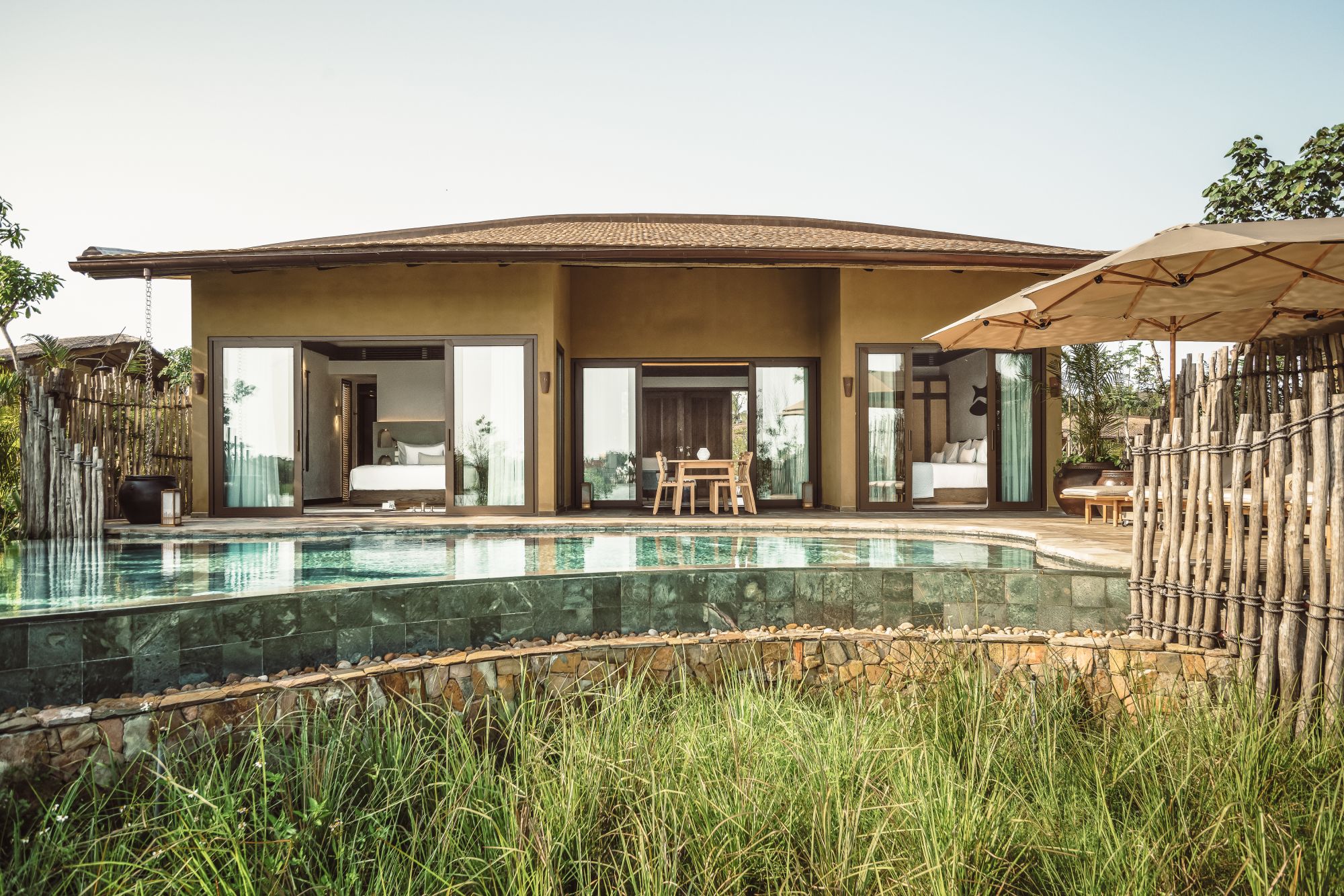 Namia River Retreat in Hoi An: River Family Villa | Exterior with Pool
