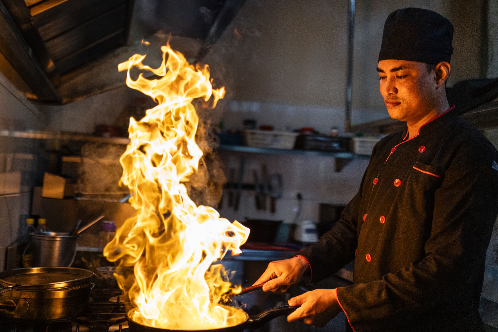 Sala Lodges in Siem Reap:  Chef at live fire cooking session