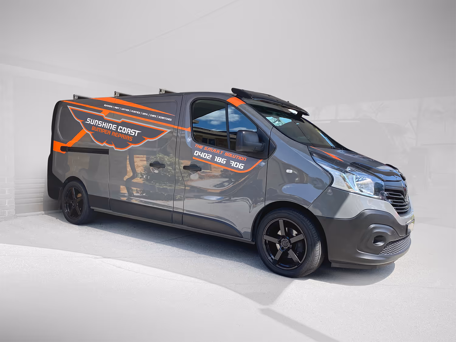 The Sunshine Coast Bumper Repairs van displaying the car wrap that Mono Creative designed.