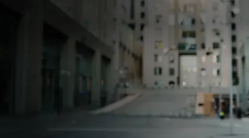 an image of a street with buildings