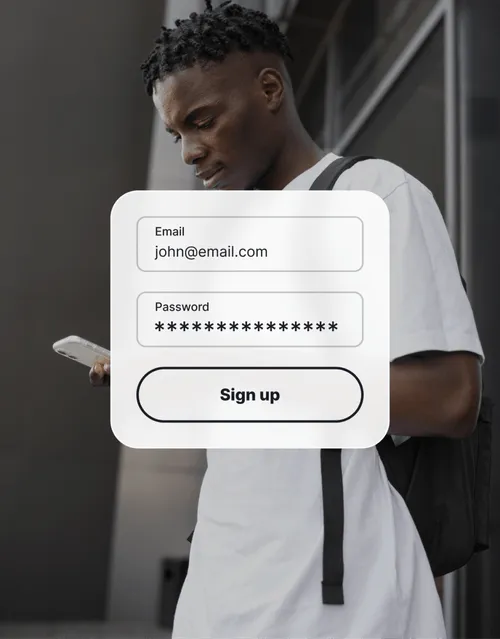 Man signing up for an account on a mobile device, showing a simple email and password input form