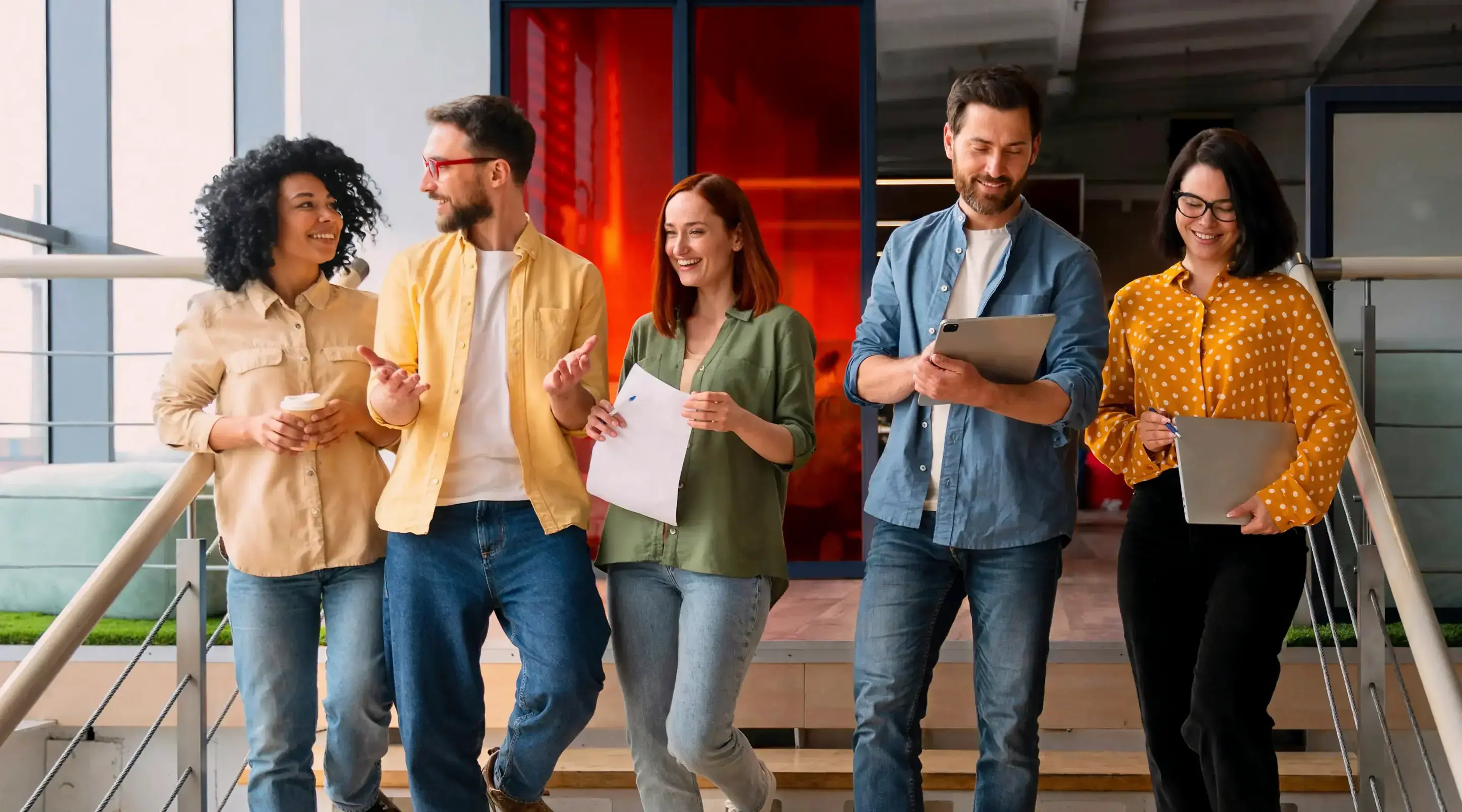 A group of professionals walking and interacting, representing the Deriv Partners program.