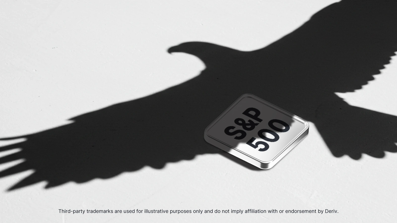 A conceptual image showing a metallic S&P 500 badge resting on a white surface.
