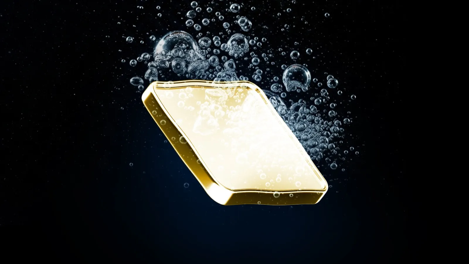 A shiny gold bar submerged underwater, surrounded by rising air bubbles against a dark background, symbolising value, resilience, and liquidity.