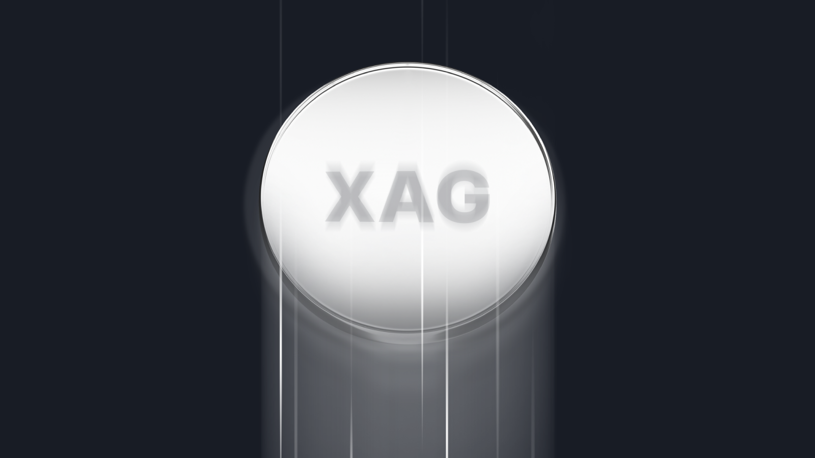 A glowing silver coin with the text "XAG" in bold letters at the centre, appearing to move downward with motion blur on a dark background.