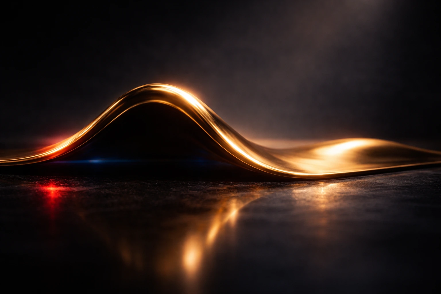 Abstract gold wave reflecting light on dark surface, symbolising price movement and market volatility