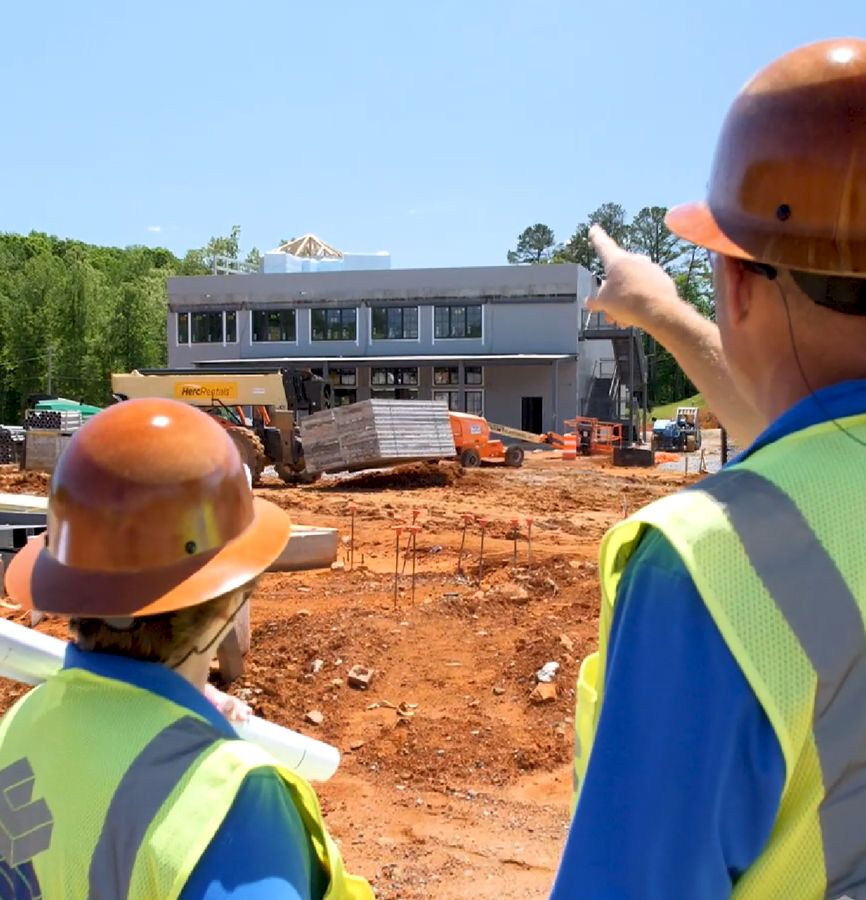 A couple of men standing next to each other.