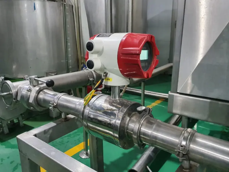 Supmea A100 electromagnetic flow meter installed on stainless steel process pipework.