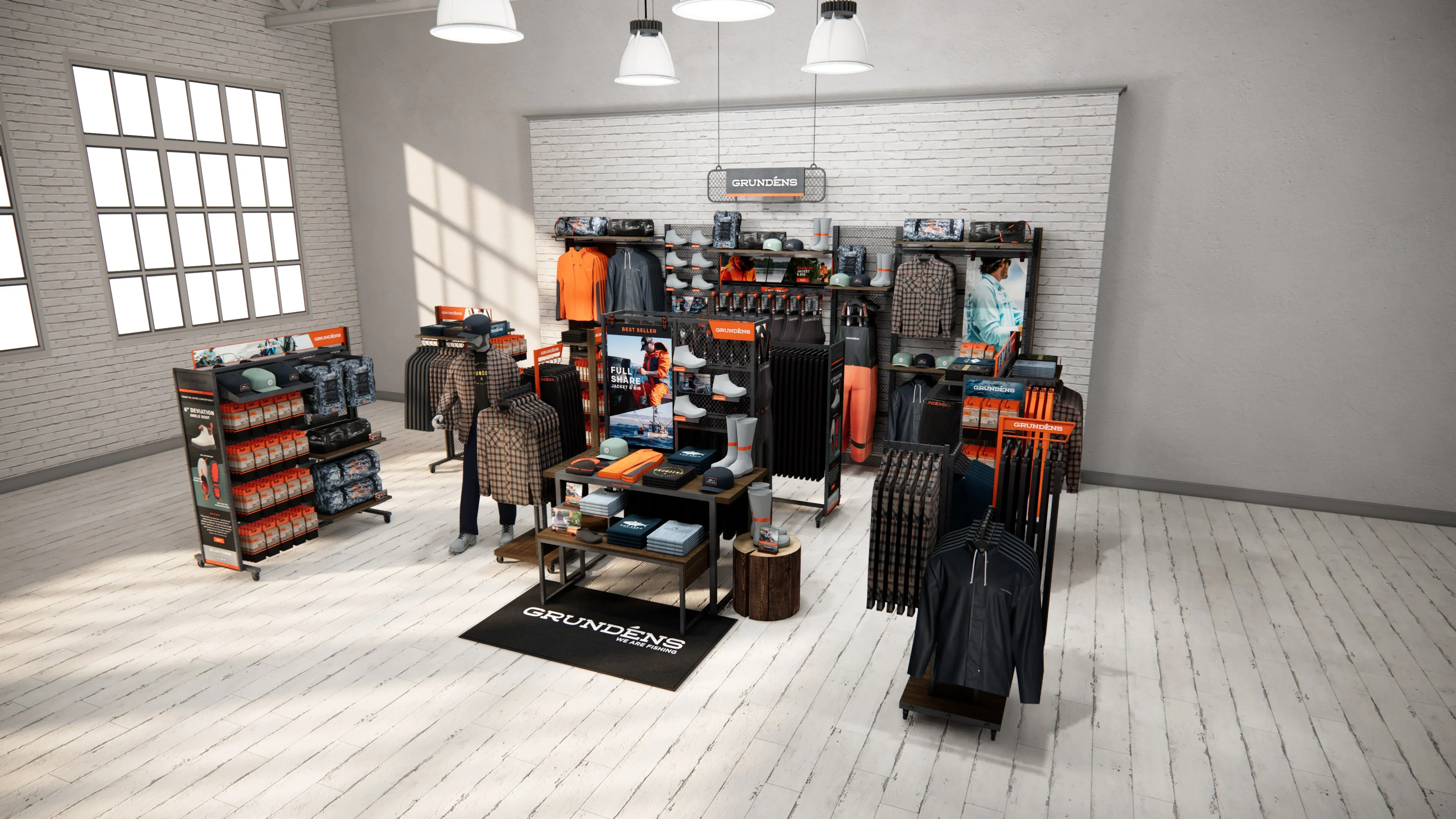 Grundens fishing and outdoor apparel retail store with orange and black branding, wall-mounted clothing displays, apparel racks, and product merchandising