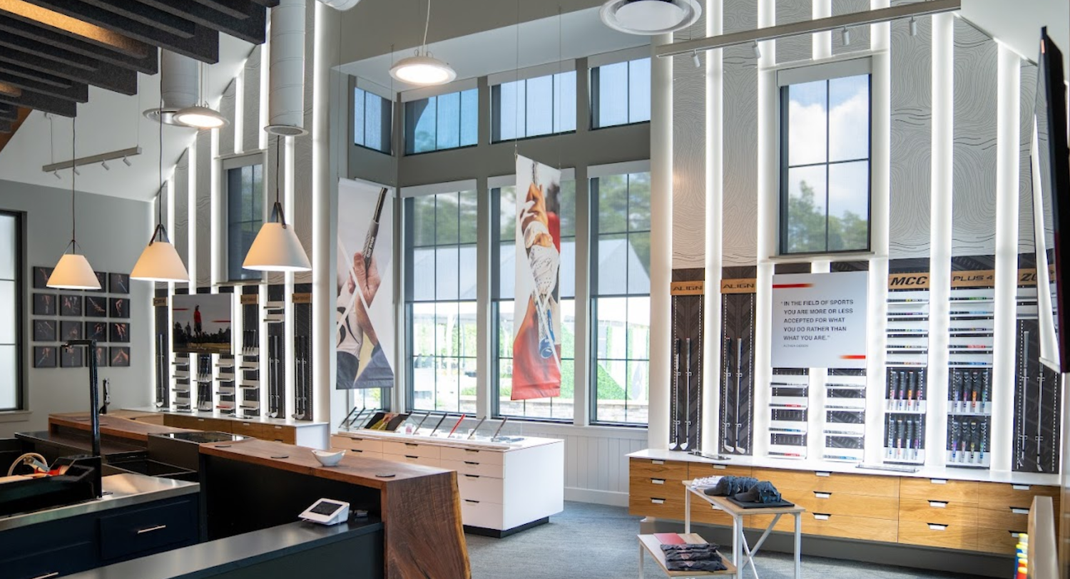 Golf Pride Retail Lab showroom interior featuring branded displays, premium retail fixtures, and a layout built for customer flow and education