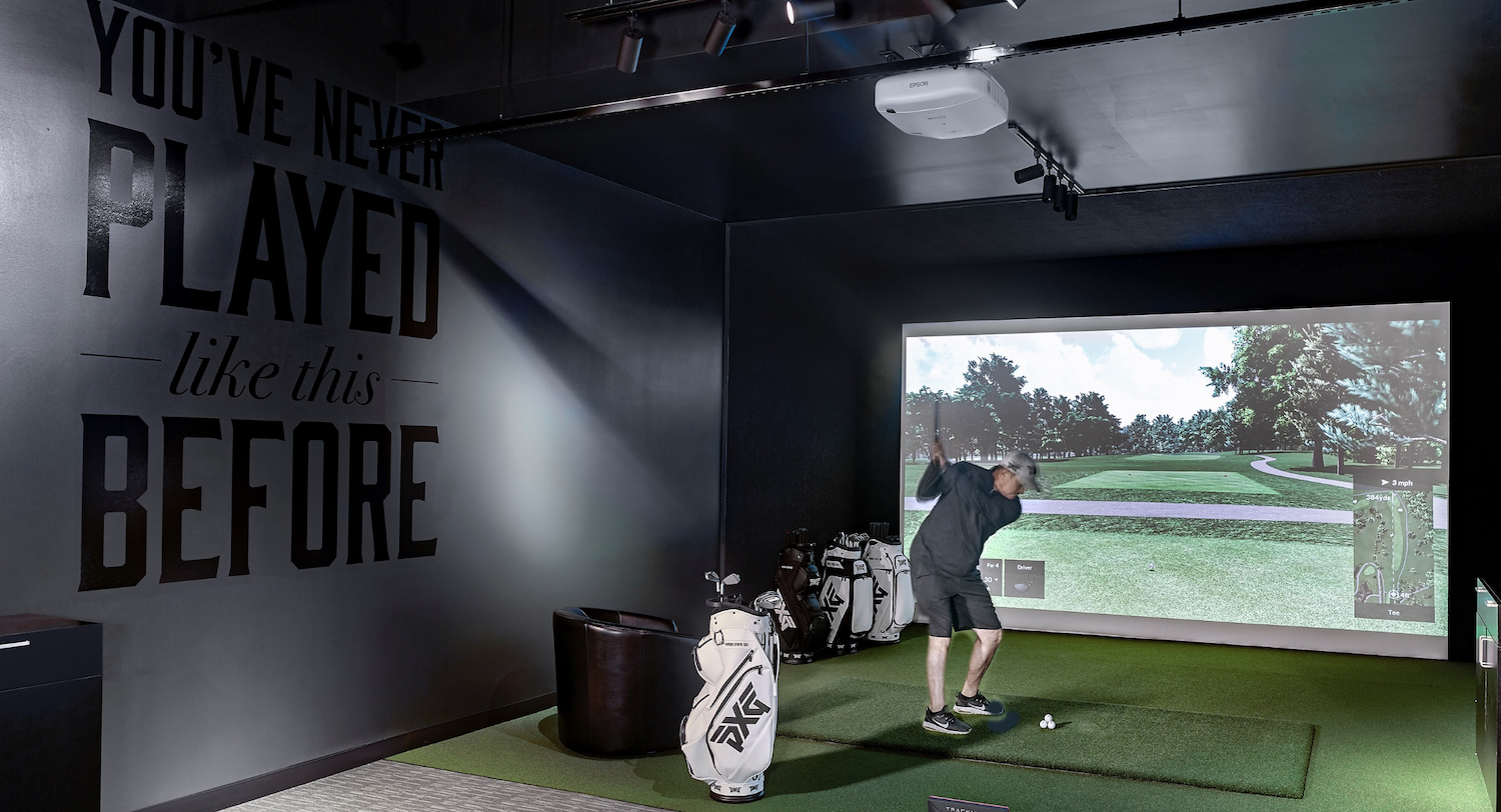 PXG Performance Studio fitting bay featuring custom retail fixtures, premium product displays, and consultation space
