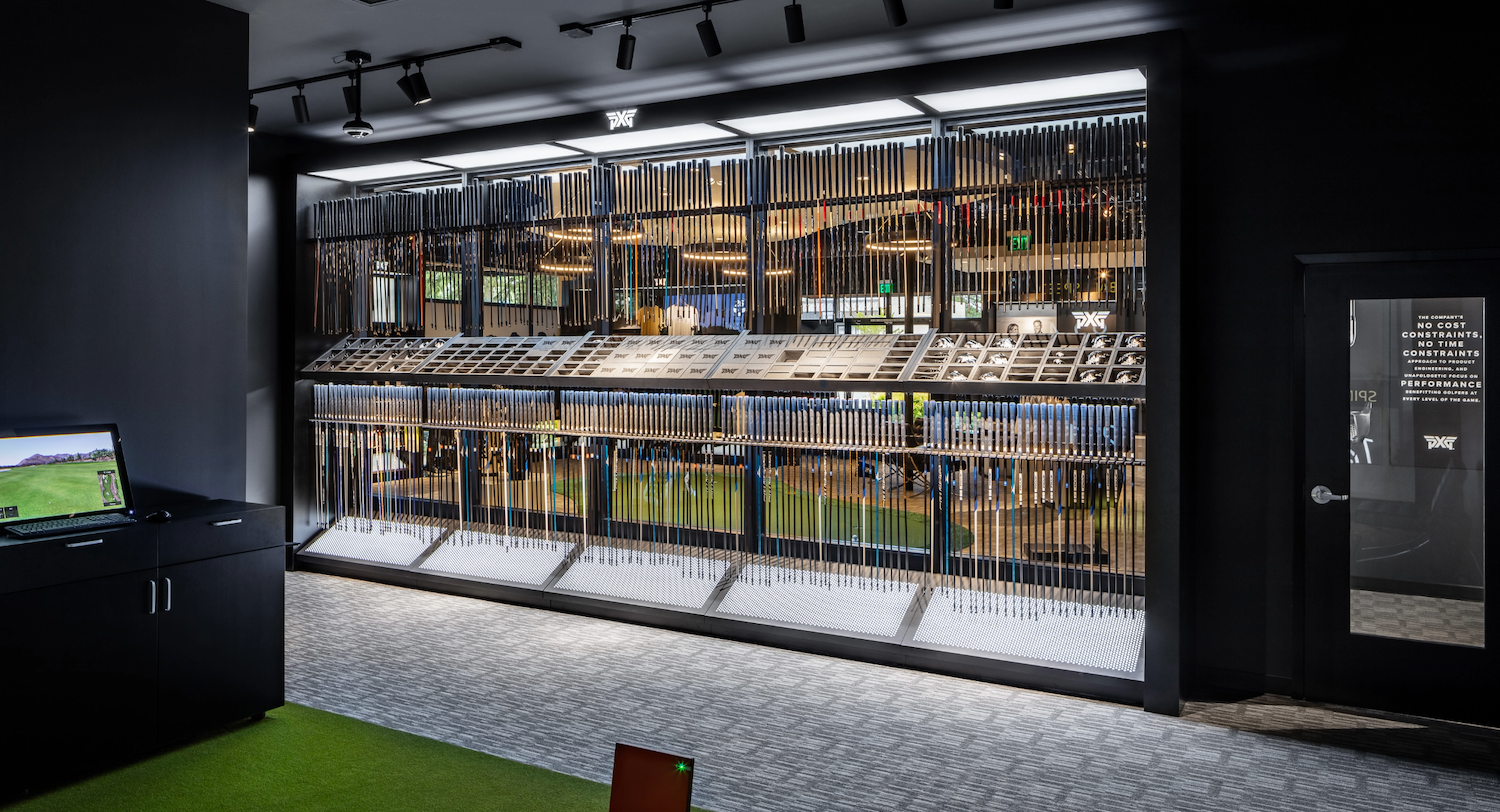 PXG Performance Studio interior showcasing premium golf retail design, fitting consultation space, and branded merchandising systems