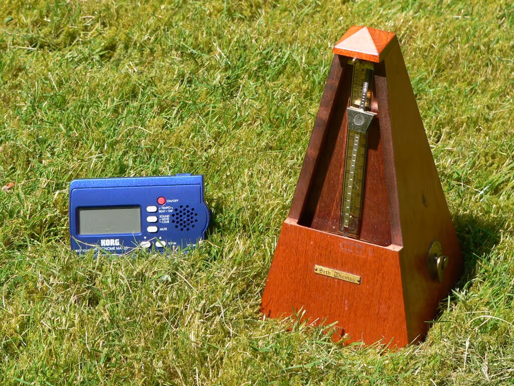 Examples of a digital and analog metronomes.