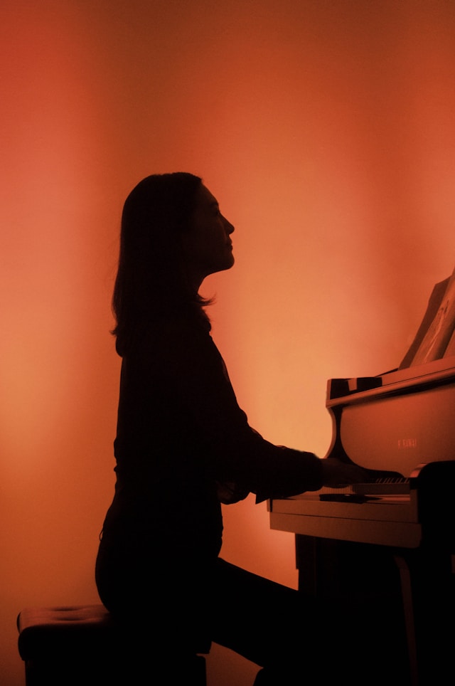 Female pianist making money playing piano sight reading,