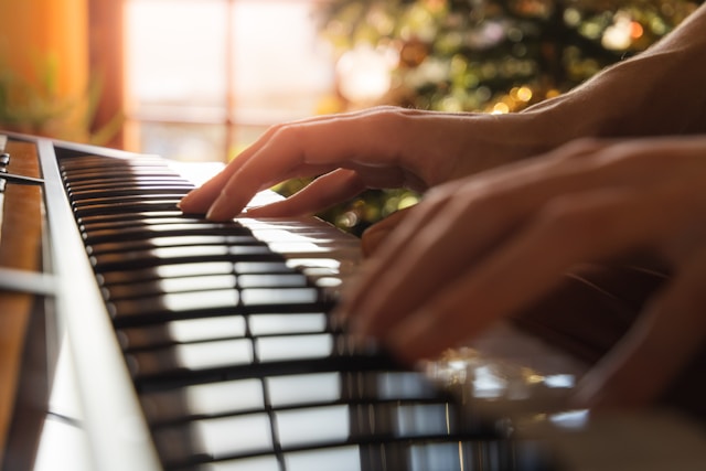 Music lover playing piano during the holiday season