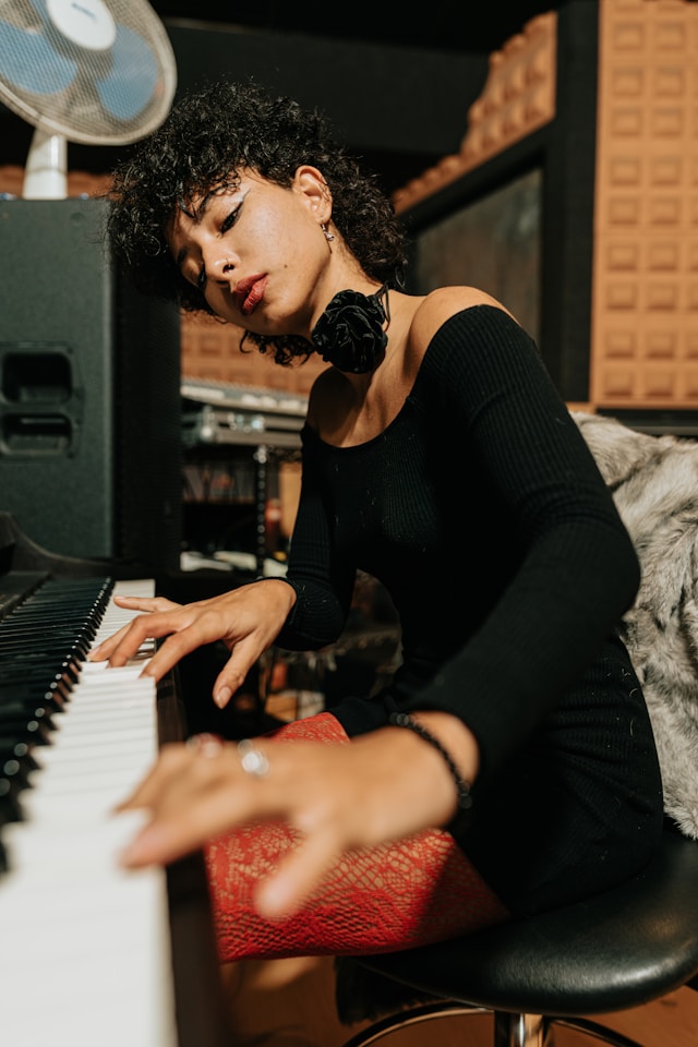 Musician deeply focused while playing piano in a flow state