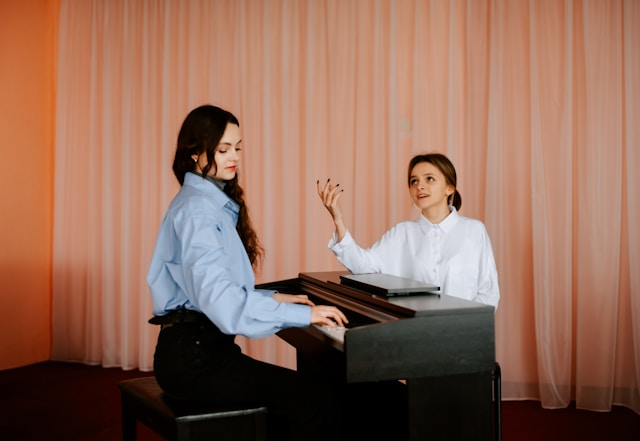 Pianist performing an expressive piece on stage.