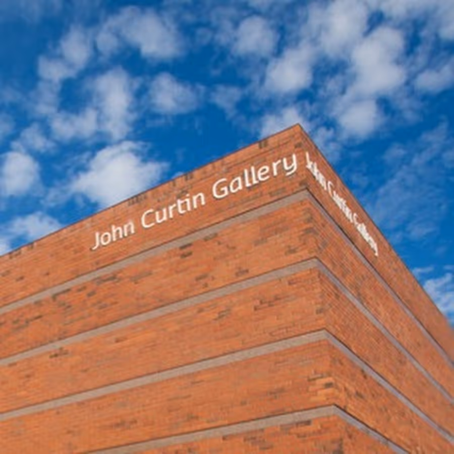 John Curtin Gallery, a brick building with its name in raised lettering on the exterior
