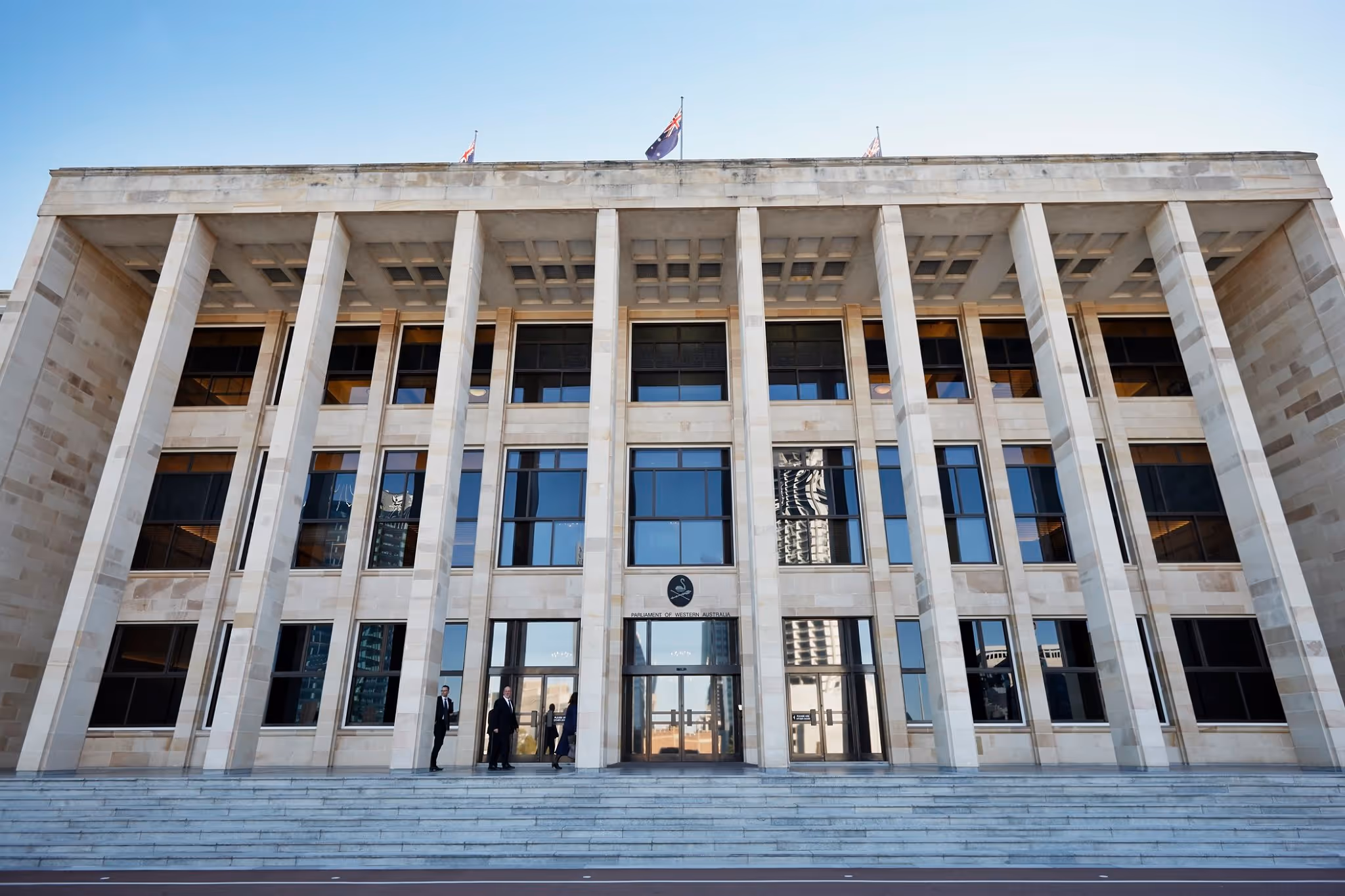 Parliament House, a historical government building with large columns and a stone facade