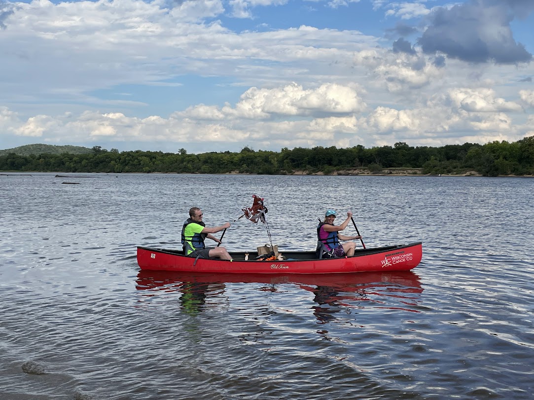 A couple canoeing in the Driftless region