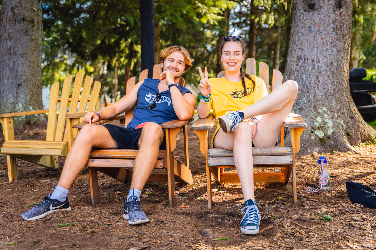 Two friends together at summer camp.