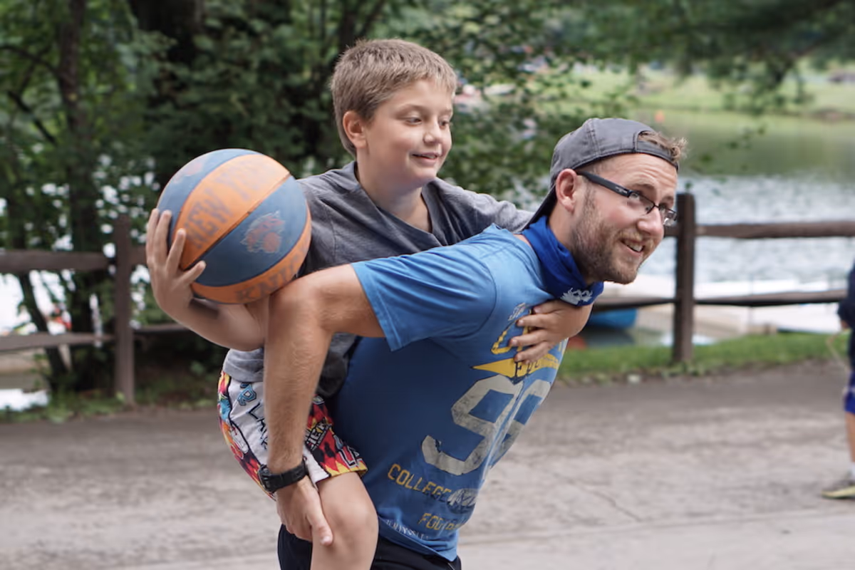 Camp counselor with campers