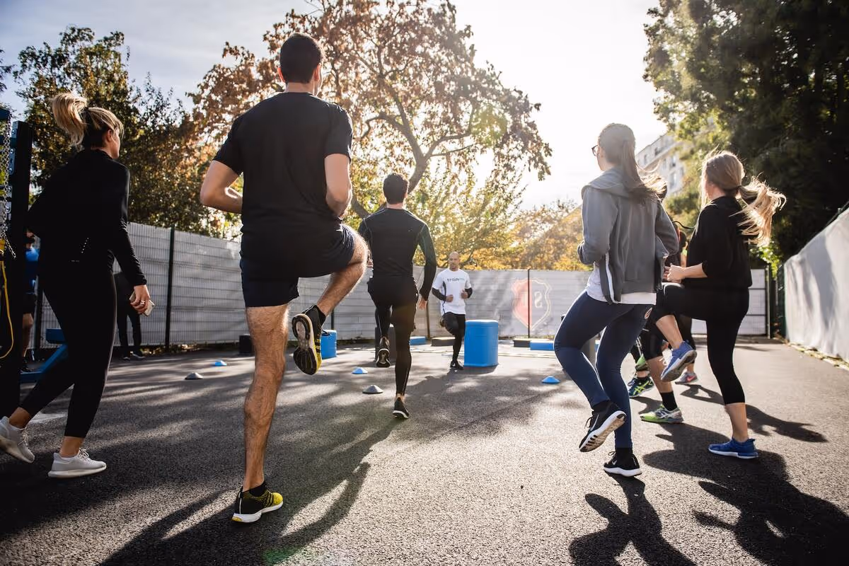 A group exercising outside.